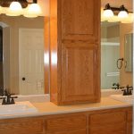 Adding a cabinet on top of a long counter between sinks in the .