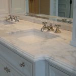 Looking for custom bathroom vanity tops with sinks in Tamp