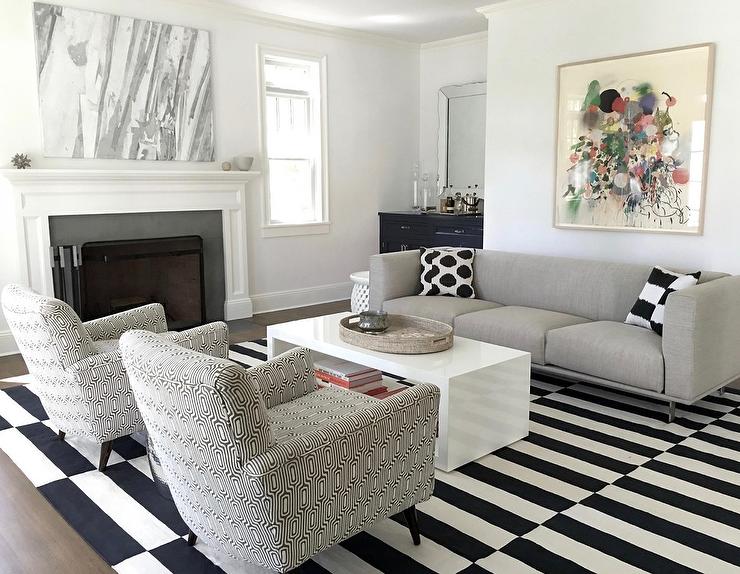 Gray Modern High Back Sofa with Black and White Pillows .