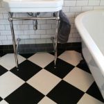New bathroom. Black and white chequerboard vinyl floor tiles from .