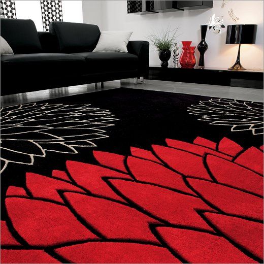 This room is colored in black and white with red as an accent .
