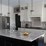 White ice granite countertops for a fantastic kitchen decor .