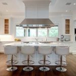 Island with white Leather Barrel Back Counter Stools, Transitional .