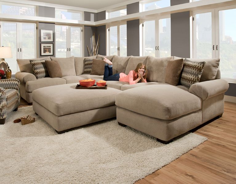 Massive sectional featuring an extra deep seat with crowned .