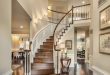 Traditional Entryway with Wainscoting, High ceiling, Chandelier .