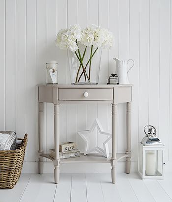 The Oxford grey half moon console table with drawer and shelf .
