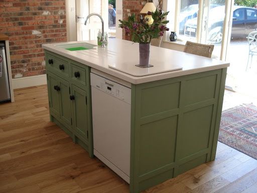 great compact kitchen island with belfast sink and a dishwasher .