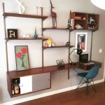 This Mid Century Modern style Walnut Wall Shelving Unit can be .