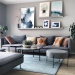 Modern living room, wall art, grey couch, Scandinavian design .