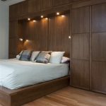Bedwall with Built-in cabinet surround & hidden door - Modern .