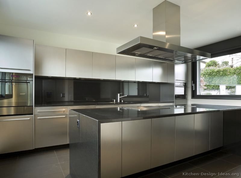 Stainless Steel Kitchen Cabinets with Black Granite Countertops .
