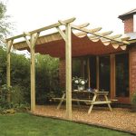 Install bifold doors new construction: Wooden pergola with cano