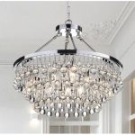 Aurore 4 - Light Crystal Chandelier with Wrought Iron Accents in .