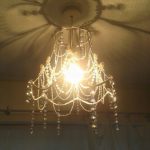 My homemade chandelier using strings of pearls, crystals and an .
