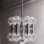 Beautiful chrome and clear glass chandelier- Designed by Motoko .