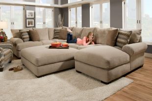 Massive sectional featuring an extra deep seat with crowned .