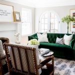 Emerald Green Velvet Tufted Sofa with Spindle Chairs .