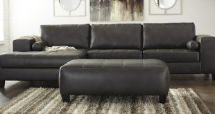Ashley Furniture 87701-16-67-08 3 pc Nokomis charcoal faux leather .