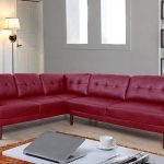 F5006B 2 pc Luss red faux leather sectional sofa with throw .