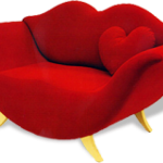 Furniture Photograph: Red Sofa With Lips Shape And Love Cushions .