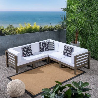 Brayden Studio Seaham Patio Sectional with Cushions Frame Color .