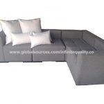 Crissy sectional sofa with pillows available in fabric and leather .