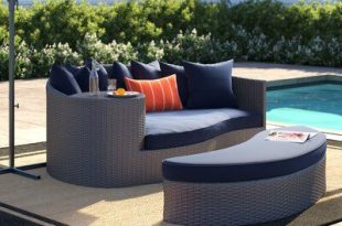Brayden Studio Tripp Patio Daybed with Cushions Fabric: Navy in .