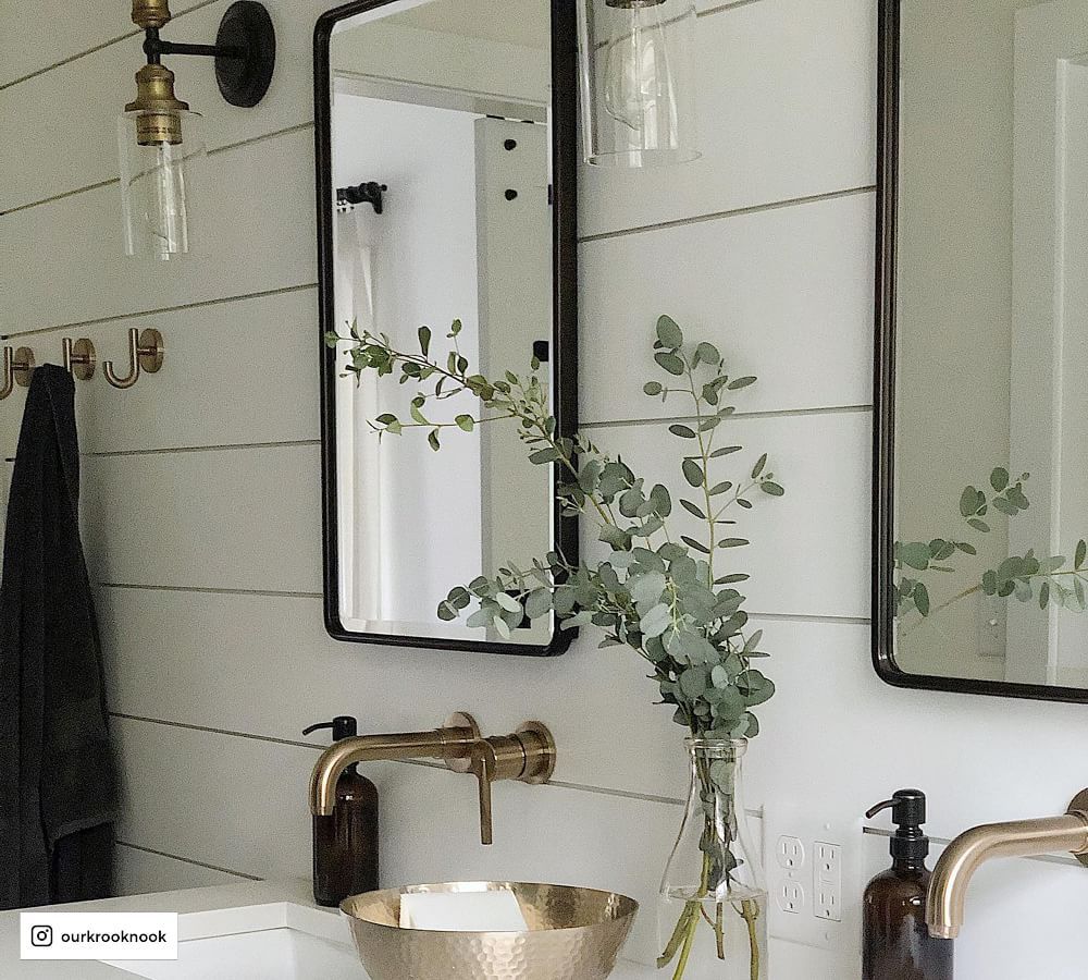 Beautiful and Functional: The Versatility of a Black Medicine Cabinet with Mirror