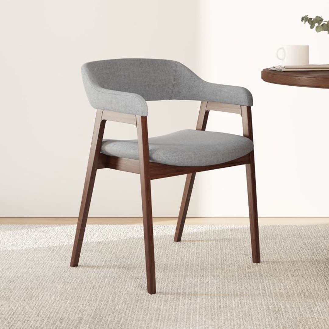 Comfort and Style: The Benefits of Fabric Dining Chairs with Arms