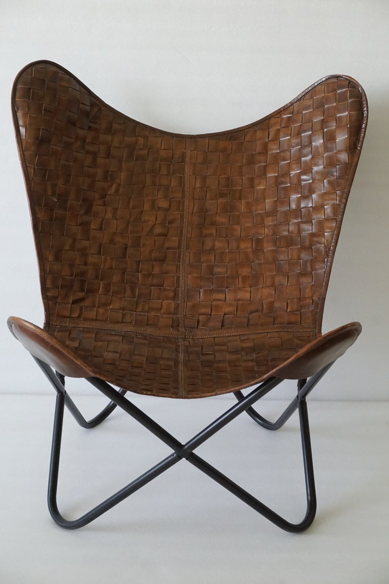 Embrace Classic Style with a Brown Leather Butterfly Chair: A Timeless Addition to Any Home