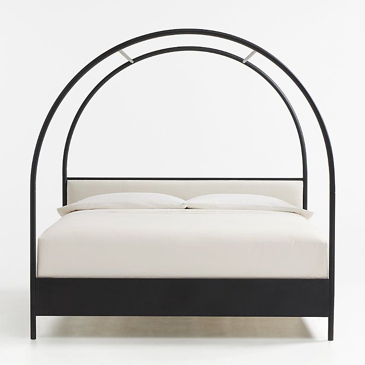 Enhance Your Bedroom with a Luxurious Canopy Bed Featuring an Upholstered Headboard