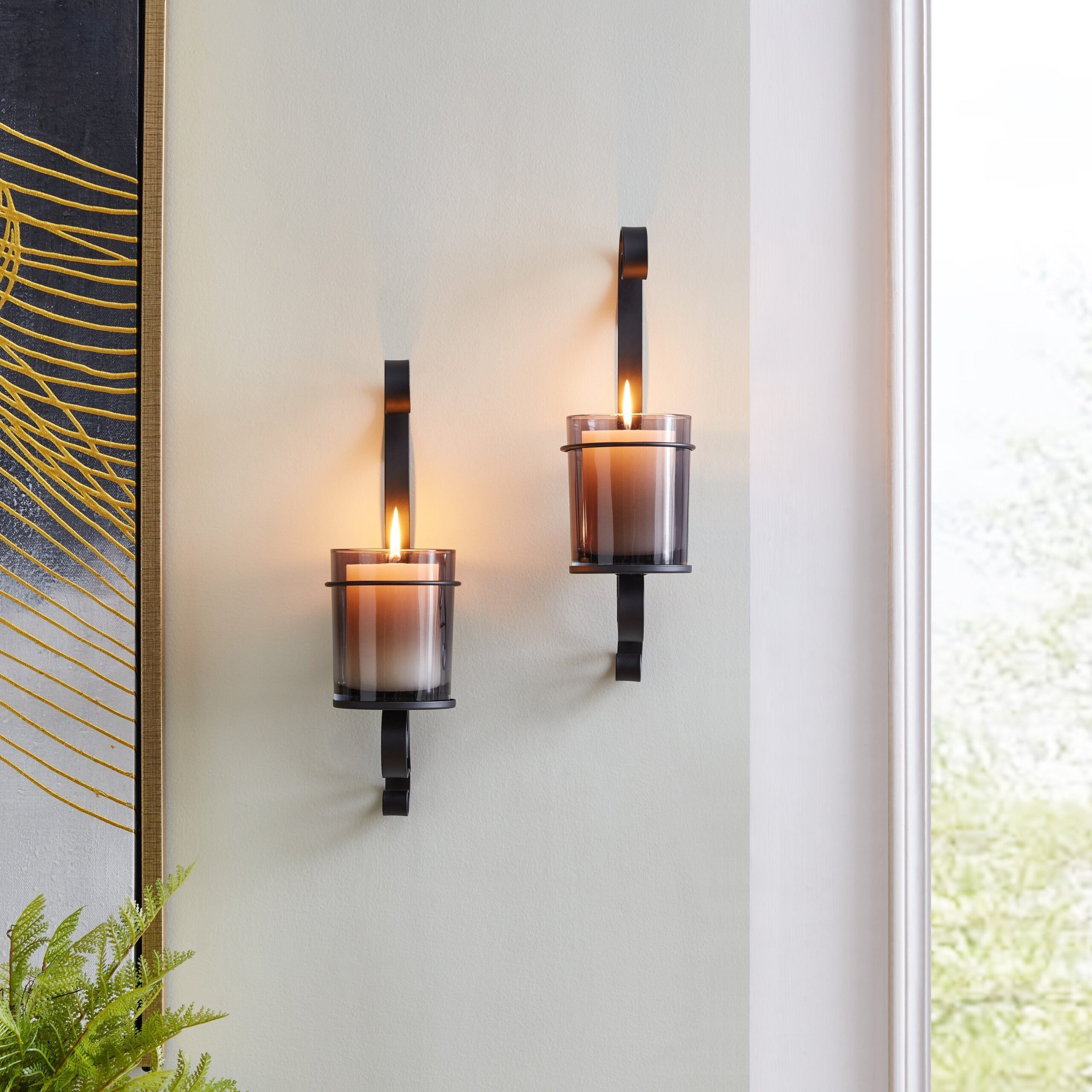 Enhance Your Home Decor with Stylish Metal Wall Decor Featuring Candle Holders