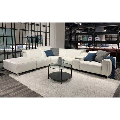 Luxurious Living: The Timeless Elegance of a Modern White Leather Sectional Sofa