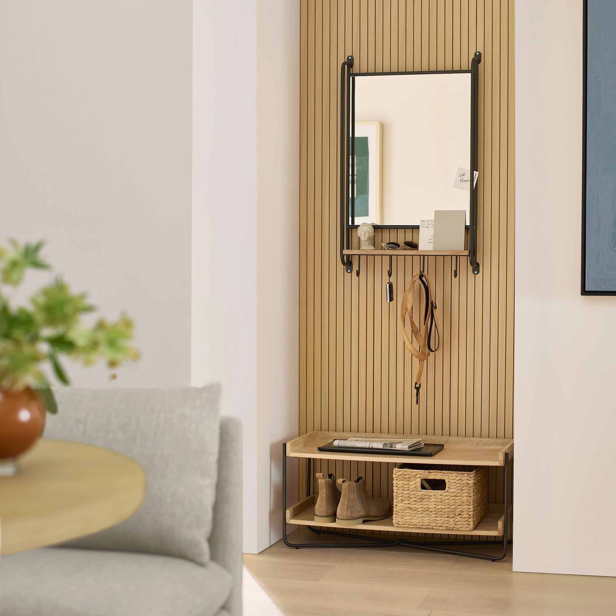 Maximize Your Entryway Space with a Mirror, Hooks, and Shelf Combo