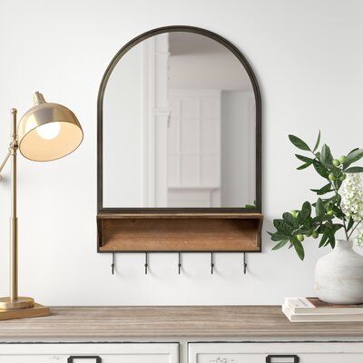 Maximize Your Entryway Space with a Stylish Mirror, Hooks, and Shelf Combo
