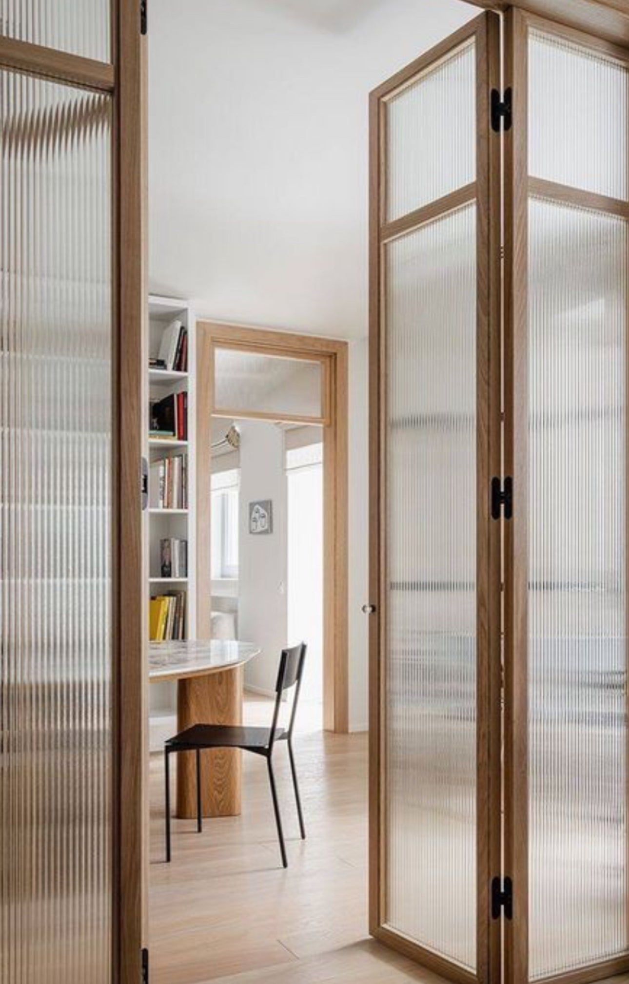 Maximizing Space and Style: The Benefits of Installing Folding Doors as Interior Room Dividers