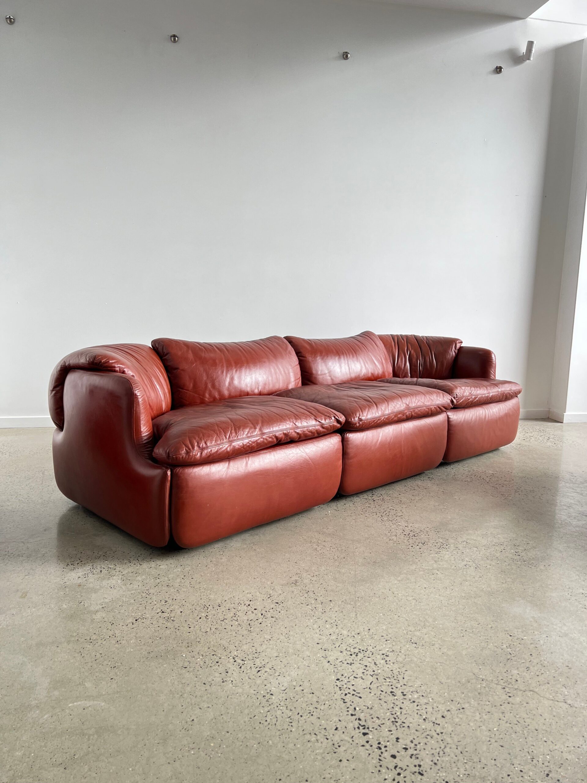 The Luxurious Charm of Red Leather Sofas: Elevate Your Living Room Décor