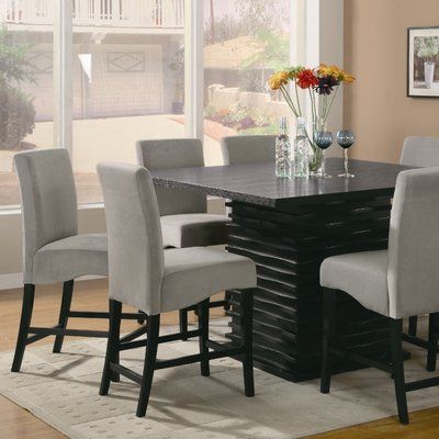 Timeless Elegance: The Beauty of a Black Counter Height Dining Table