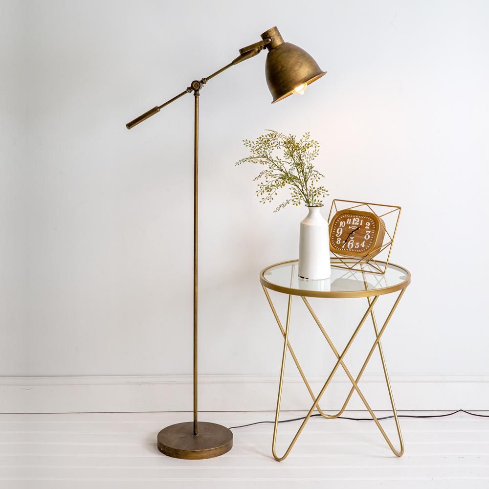 Timeless Elegance: The Beauty of an Antique Brass Swing Arm Floor Lamp
