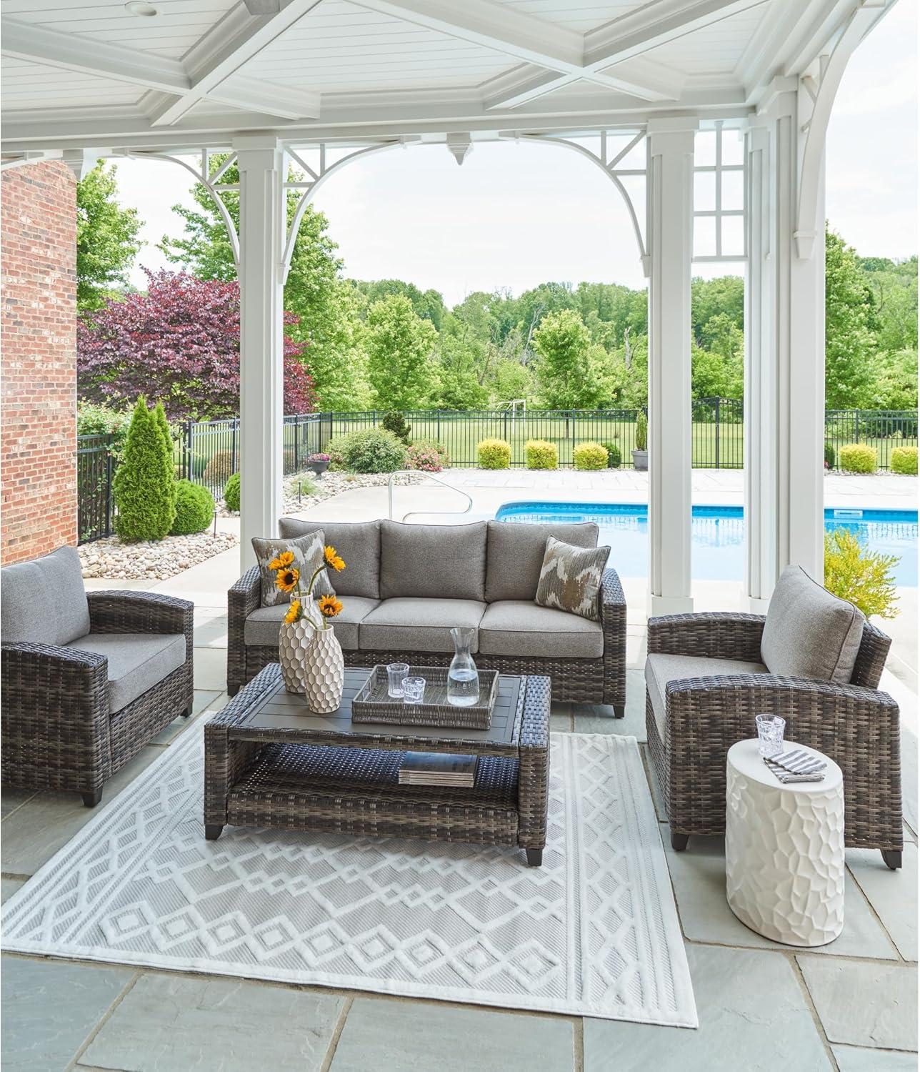 Our Take on Ashley's Oasis Court:‍ Stylish, Durable Outdoor Comfort