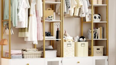 Maximizing Style And Storage With A Chic White And Gold Closet System