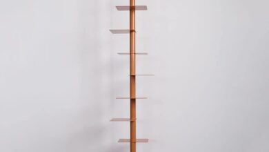 Reimagining Storage Exploring The Style And Function Of A Rotating Pink Bookshelf