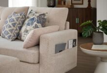 Beige U Shaped Sectional That Tucks Storage Into Its Seats
