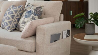 Beige U Shaped Sectional That Tucks Storage Into Its Seats